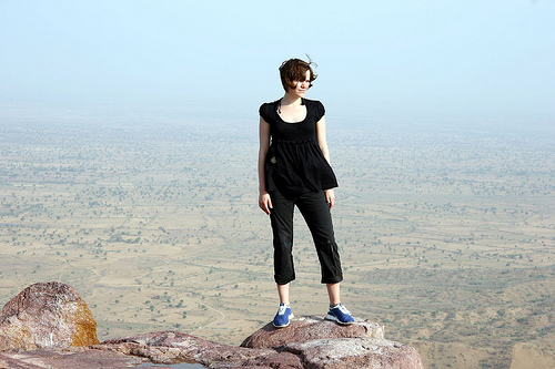 Girl on top of hill