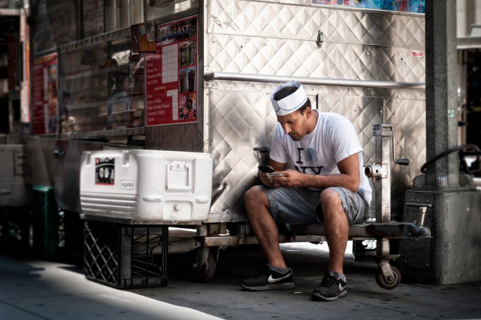 Man glued to his phone, you can break this bad habit.